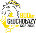 Logo jubileuszu 800-lecia miasta Głuchołazy (1222–2022) z grafiką głowy kozy w kolorach białym i żółtym na czarnym tle.